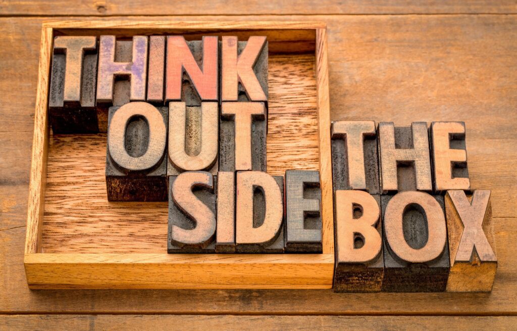 think outside the box concept in wood type